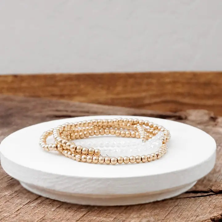 Gold and White Worn Bracelet Stack